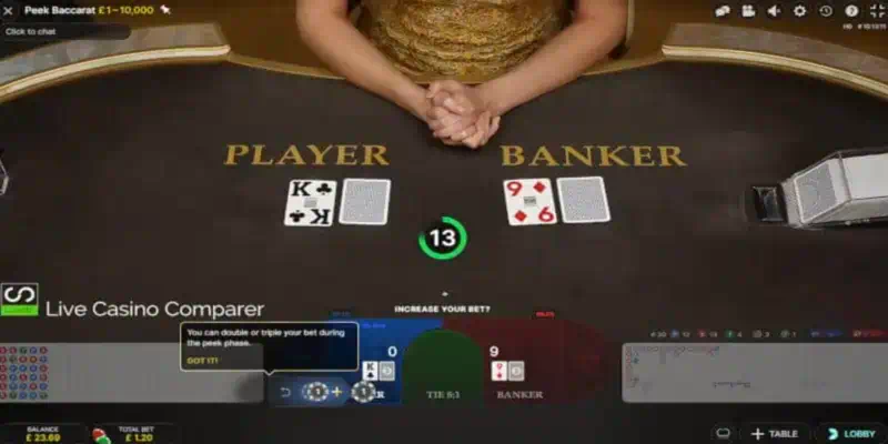 에볼루션 훔쳐보기 바카라 게임 인터페이스 전체 화면, 중앙 딜러와 플레이어-뱅커 카드 배치 공간, 하단 베팅 영역과 추가 베팅 구역이 구분된 UI 구조